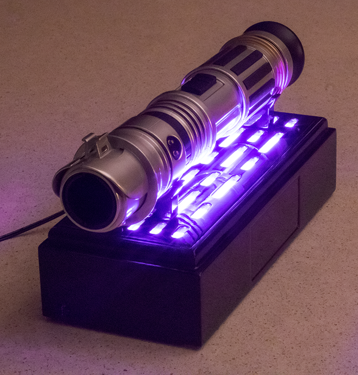 SaberStand with purple lights on